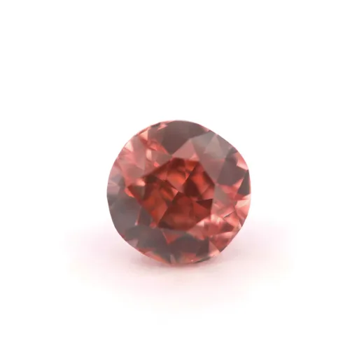 fancy orangy pink round diamond