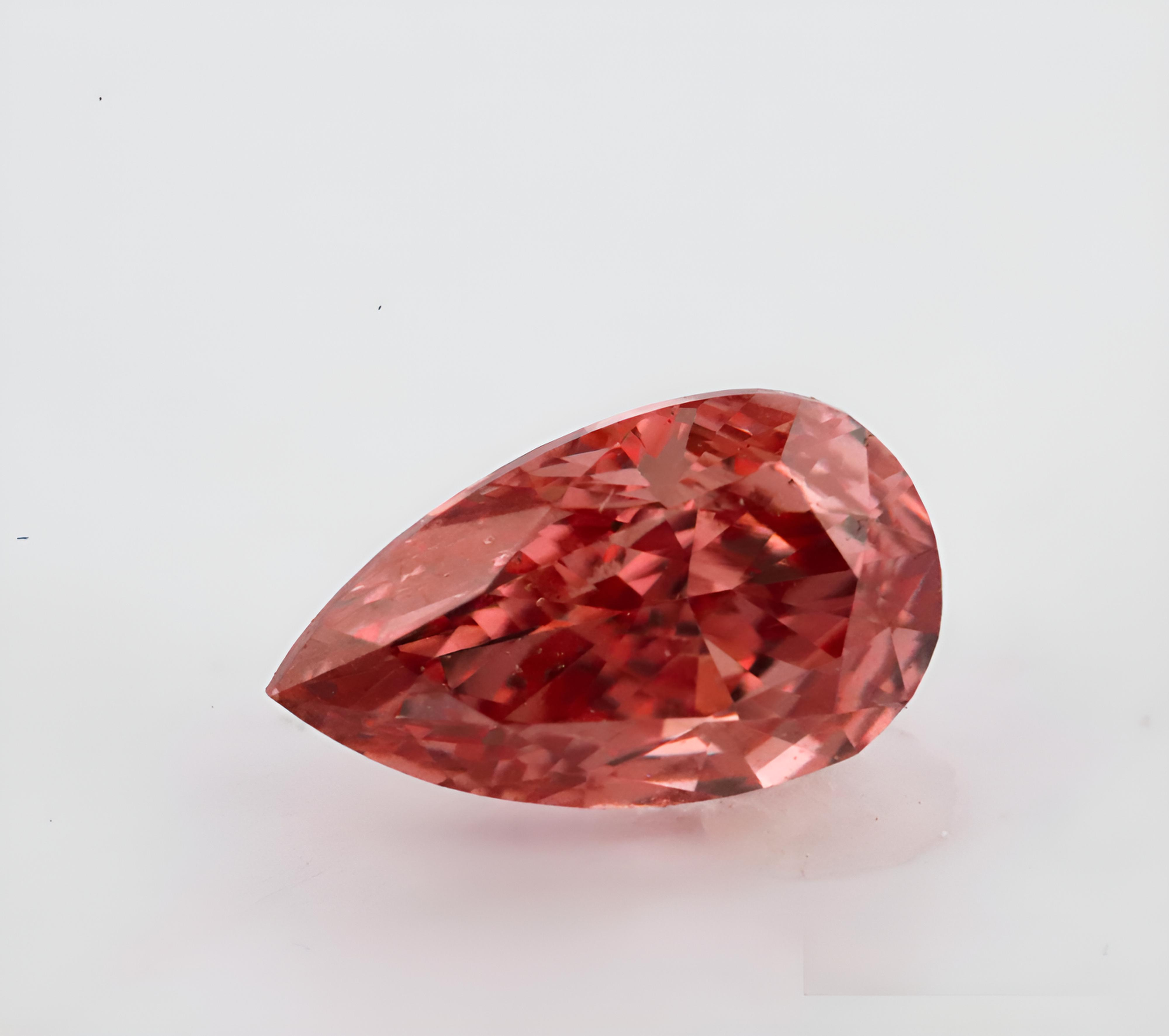 0.15 carat Carat Pear Modified Brilliant Fancy Brownish Orangy Pink SI1 GIA Certified Diamond