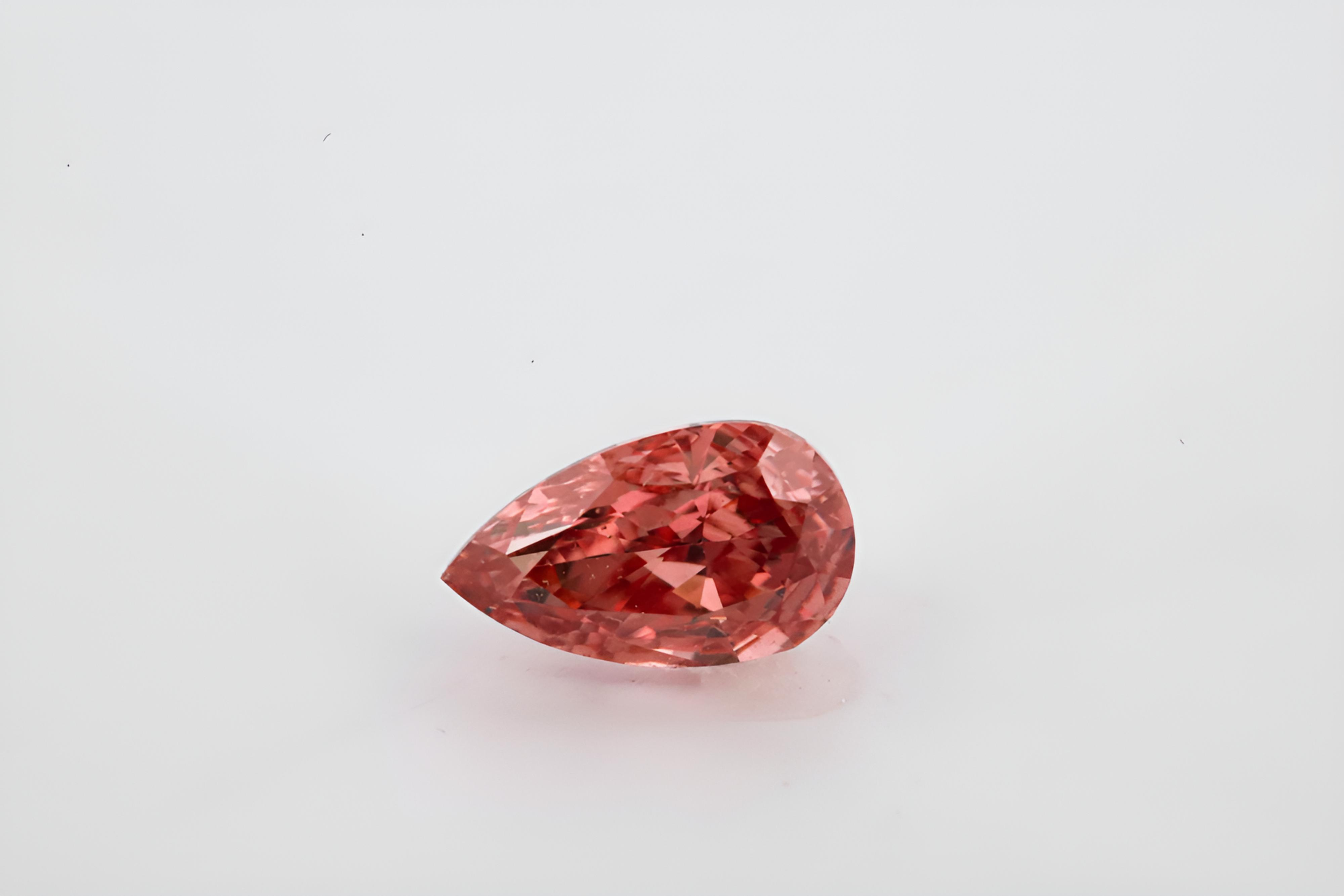 0.15 carat Carat Pear Modified Brilliant Fancy Brownish Orangy Pink SI1 GIA Certified Diamond