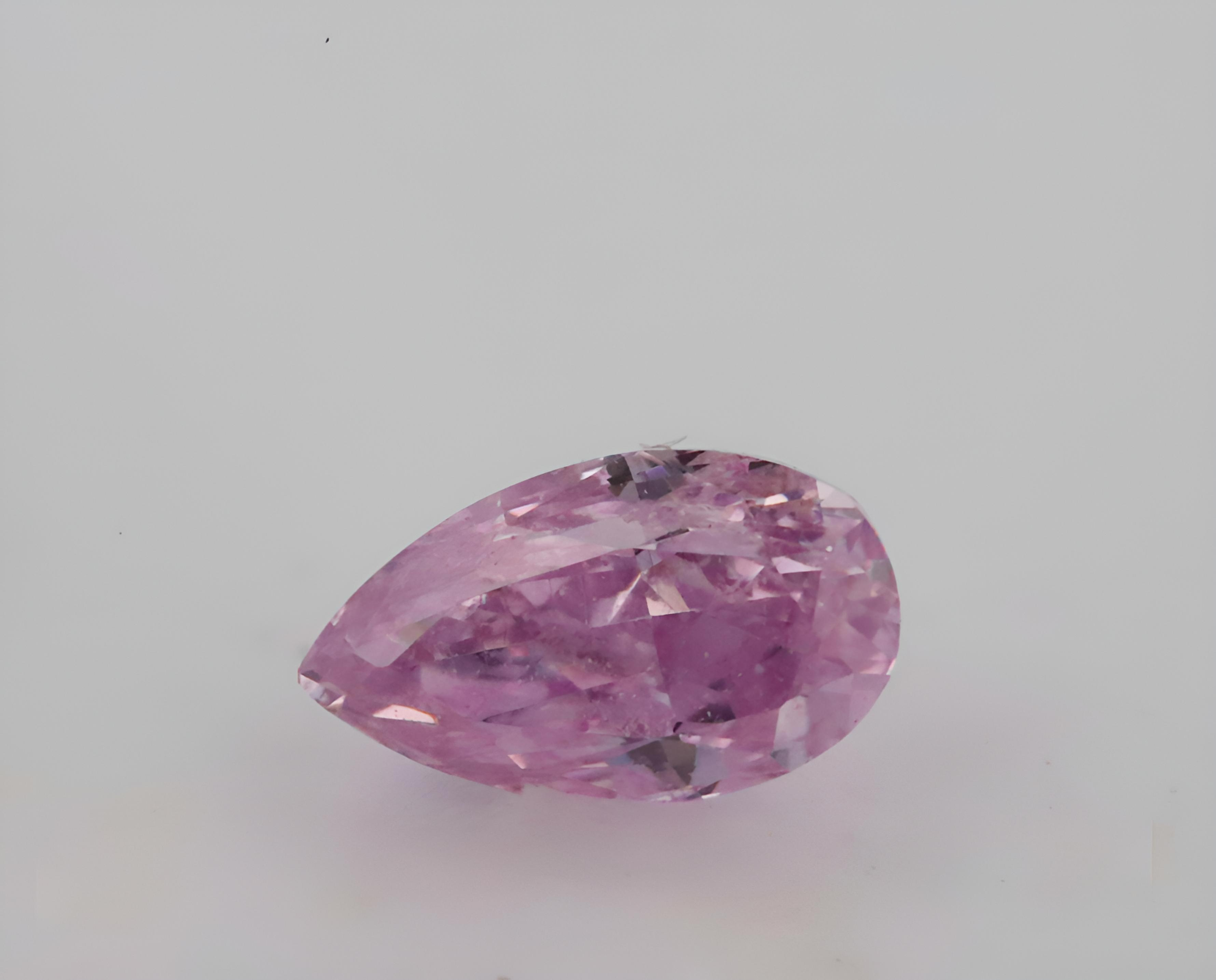 0.06 carat Carat Pear Modified Brilliant GIA Certified Diamond