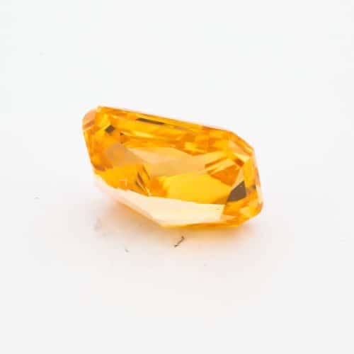 0.52 carat Carat Cut-Cornered Rectangular Modified Brilliant Fancy Vivid Yellow-Orange SI2 GIA Certified Diamond