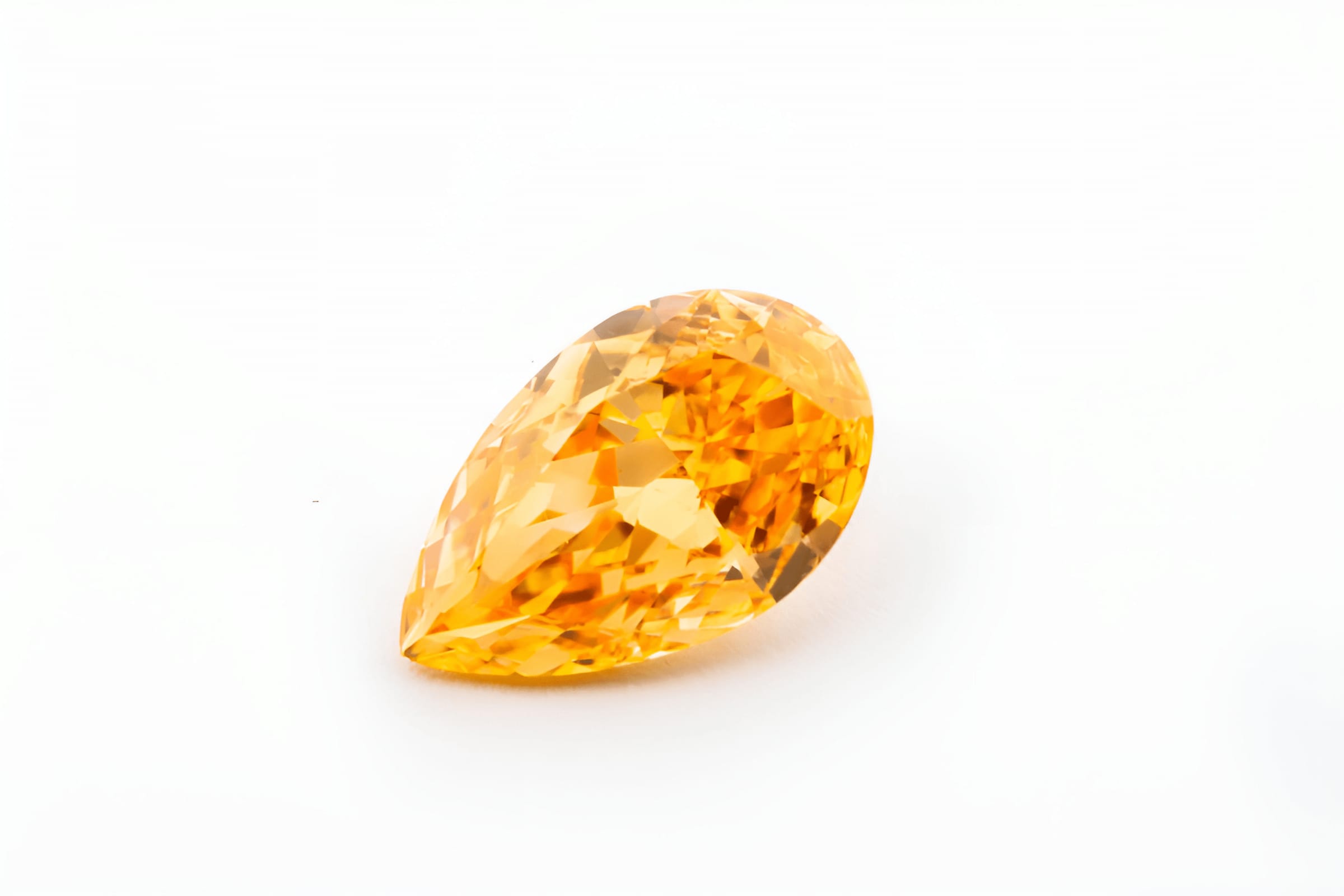 0.38 carat Carat Pear Modified Brilliant Fancy Vivid Yellow-Orange VS1 GIA Certified Diamond