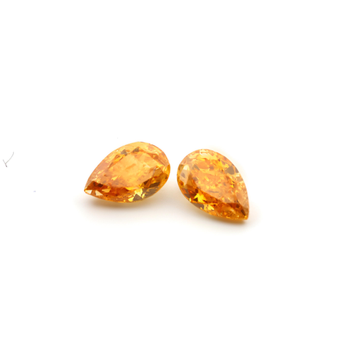 0.45ct matching pair Vivd orange diamonds pear shape GIA