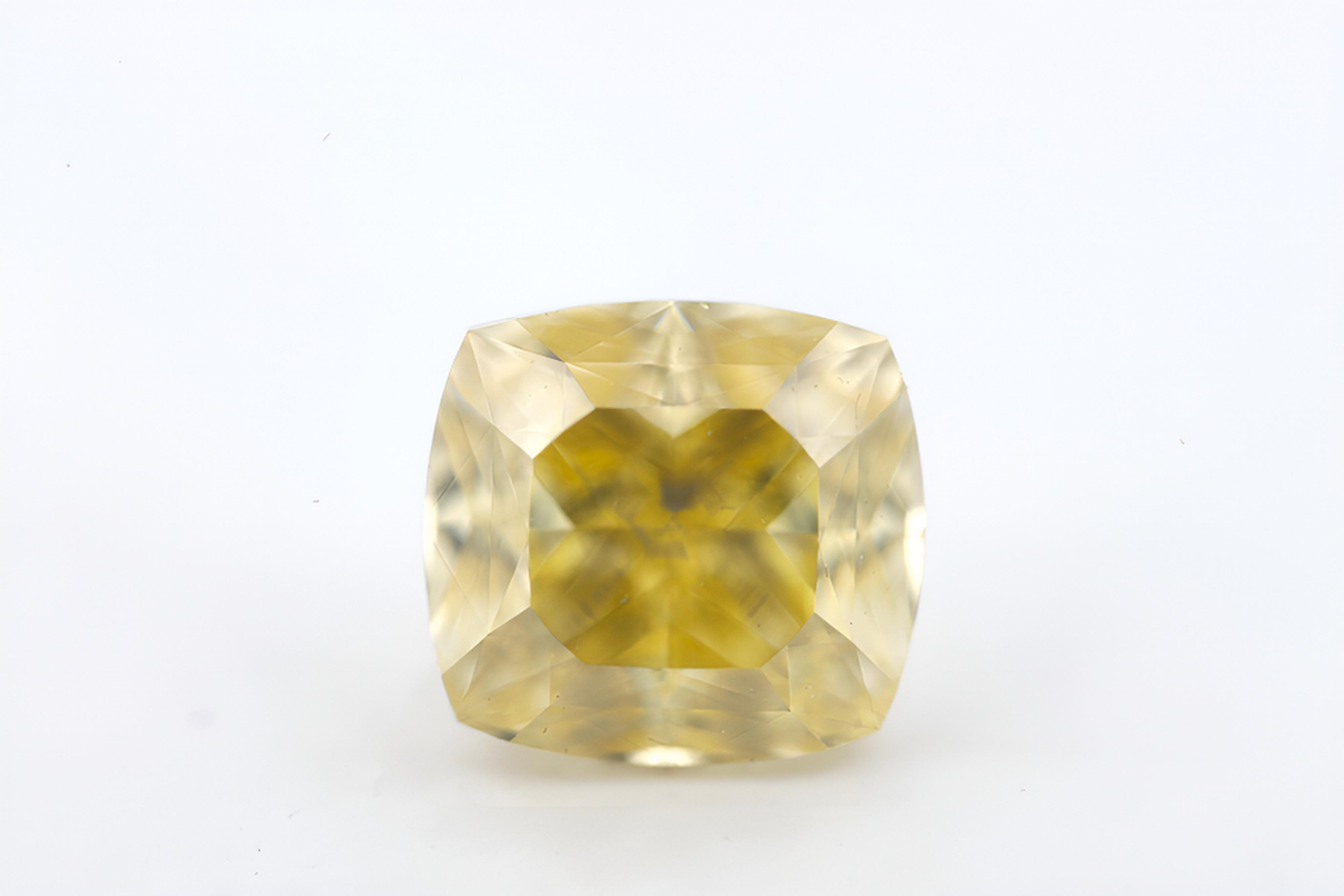 1.52 carat Carat Cushion Modified Brilliant Fancy Light Brownish Yellow VS1 GIA Certified Diamond