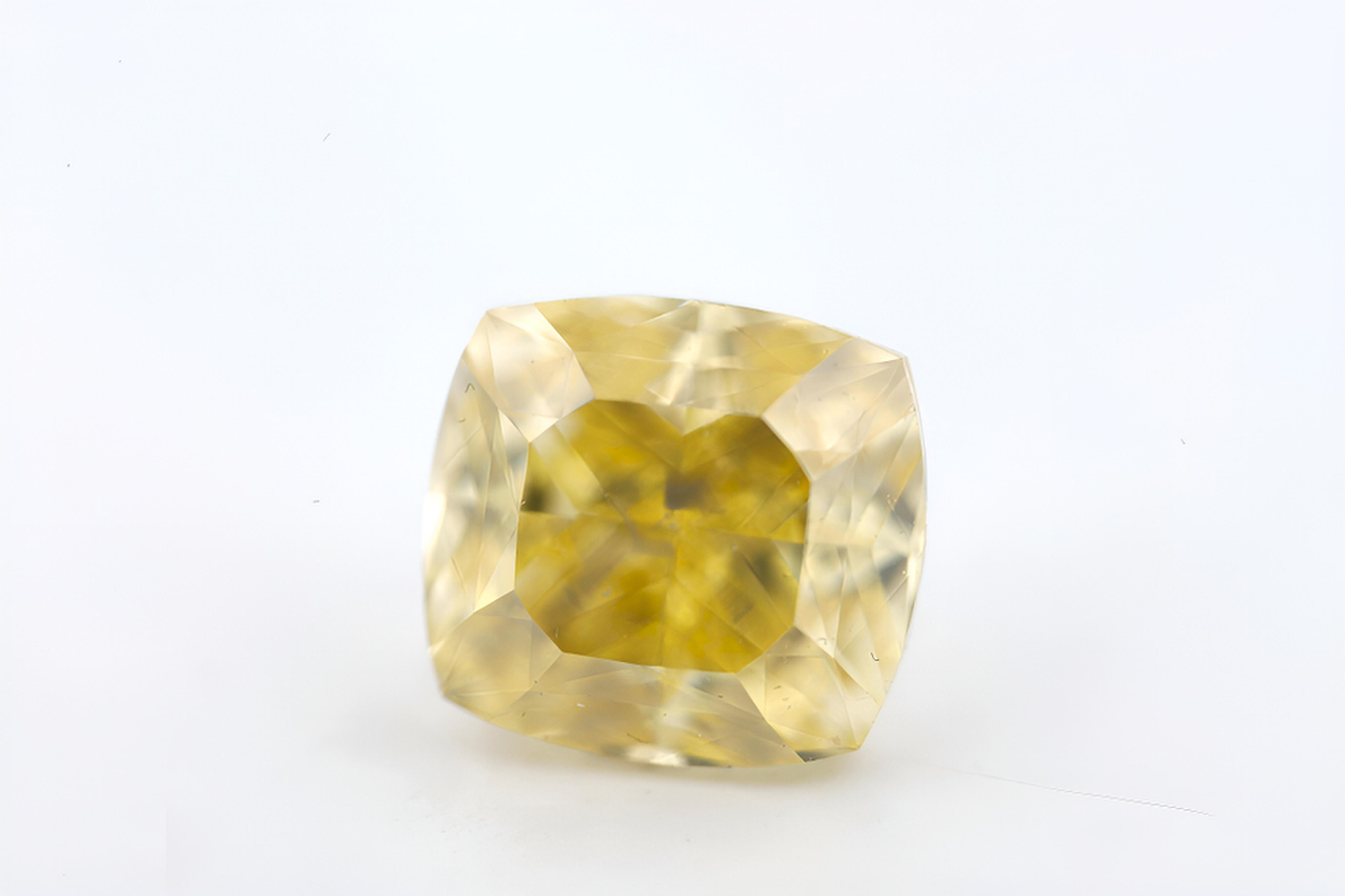 1.52 carat Carat Cushion Modified Brilliant Fancy Light Brownish Yellow VS1 GIA Certified Diamond