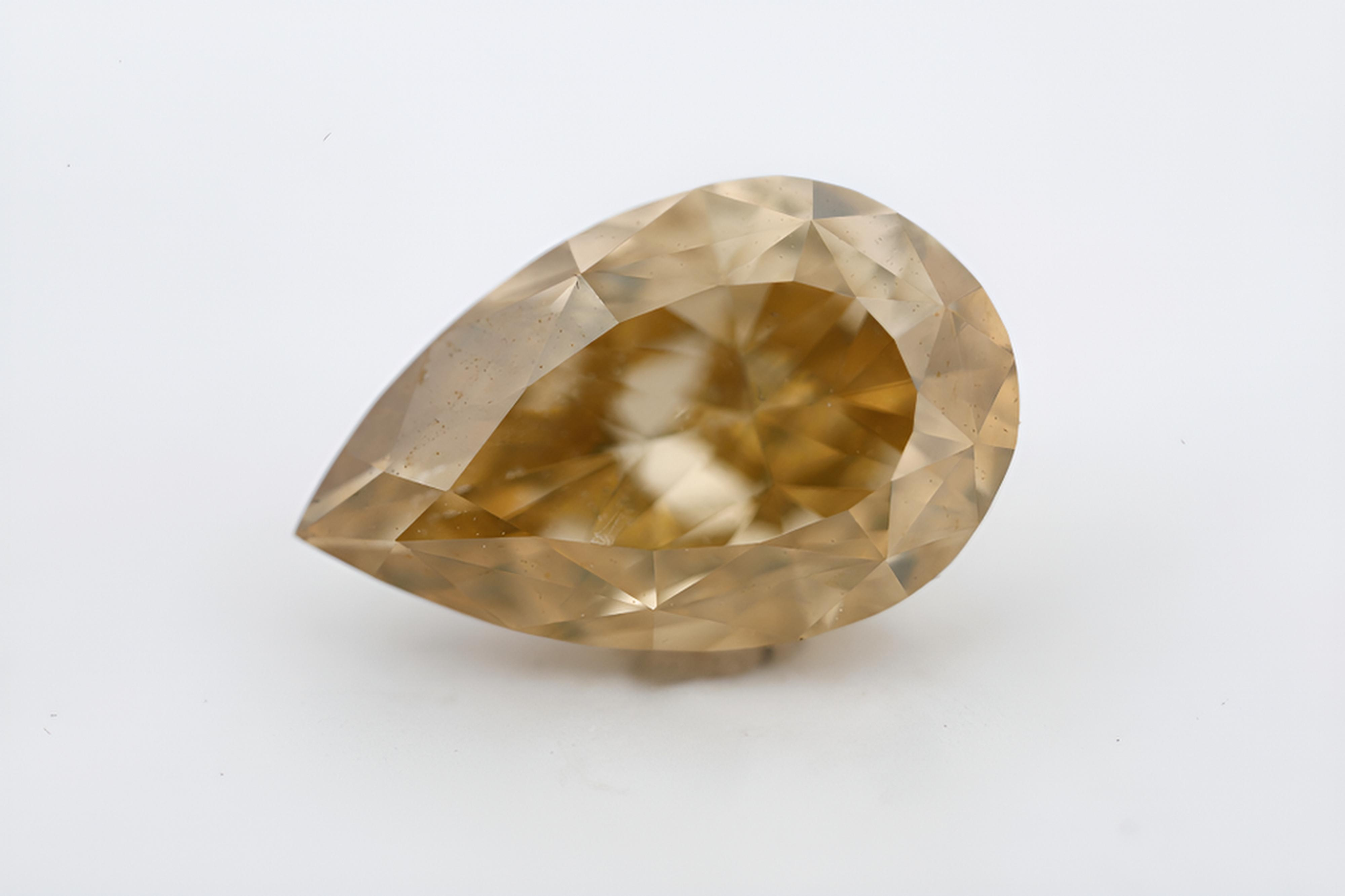 1.02 carat Carat Pear Modified Brilliant Fancy Deep Brownish Yellow VS2 GIA Certified Diamond