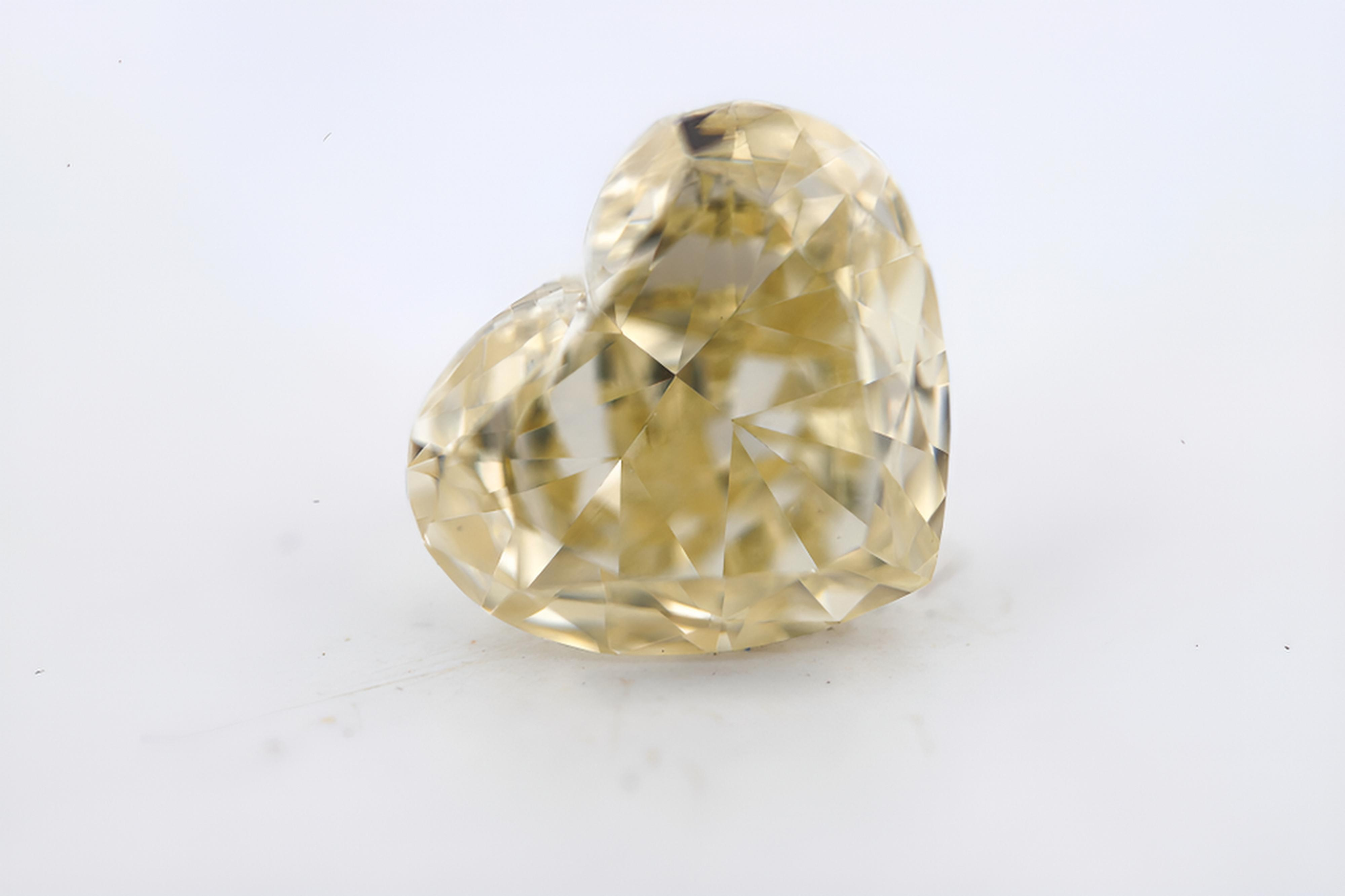 0.91 carat Carat Heart Modified Brilliant W to X Range VS2 GIA Certified Diamond
